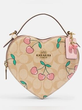 Coach sold out online/discontinued Signature Pink Leather Cherry Heart Bag